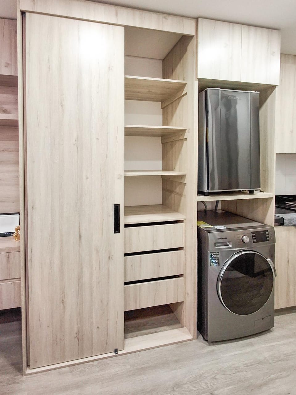 Kitchen or kitchenette, wardrobe, washing machine, dryer