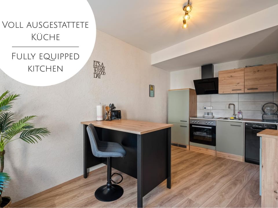 Kitchen or kitchenette, dishwasher, oven, stove