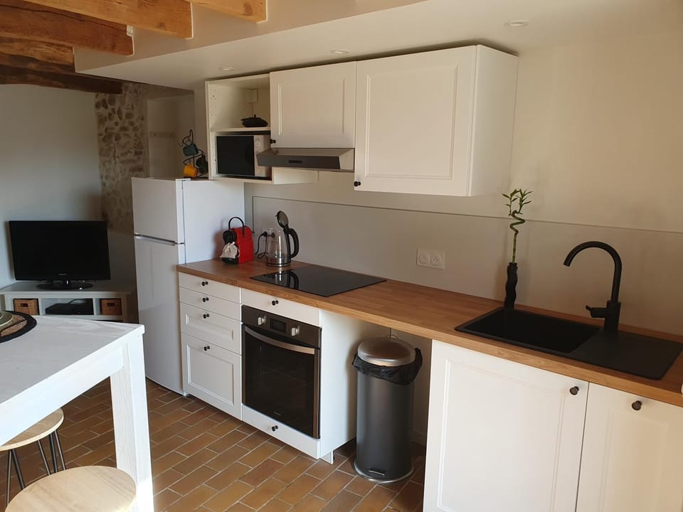 Kitchen or kitchenette, oven, stove, toaster