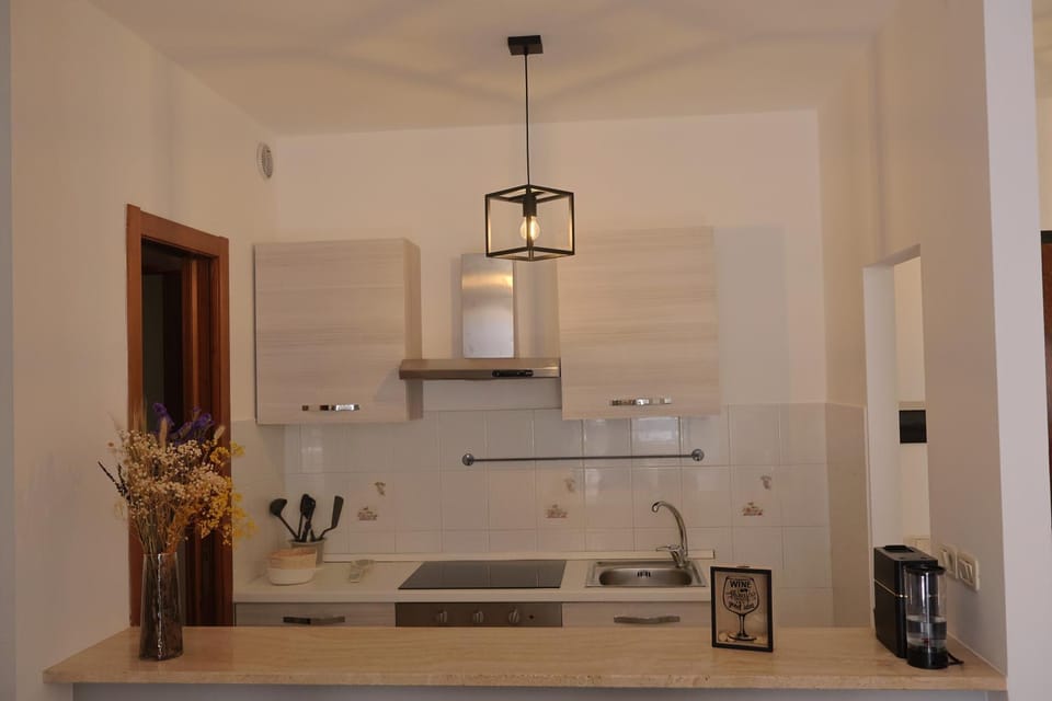 Kitchen or kitchenette, stove
