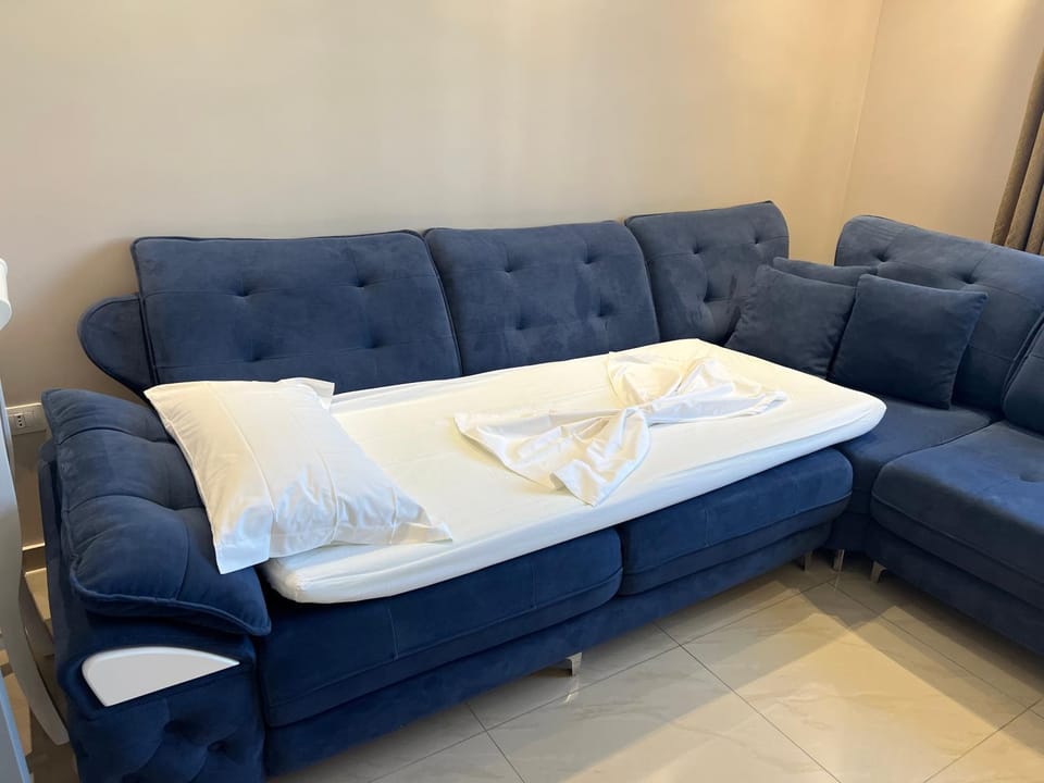 Bed, Living room, Seating area