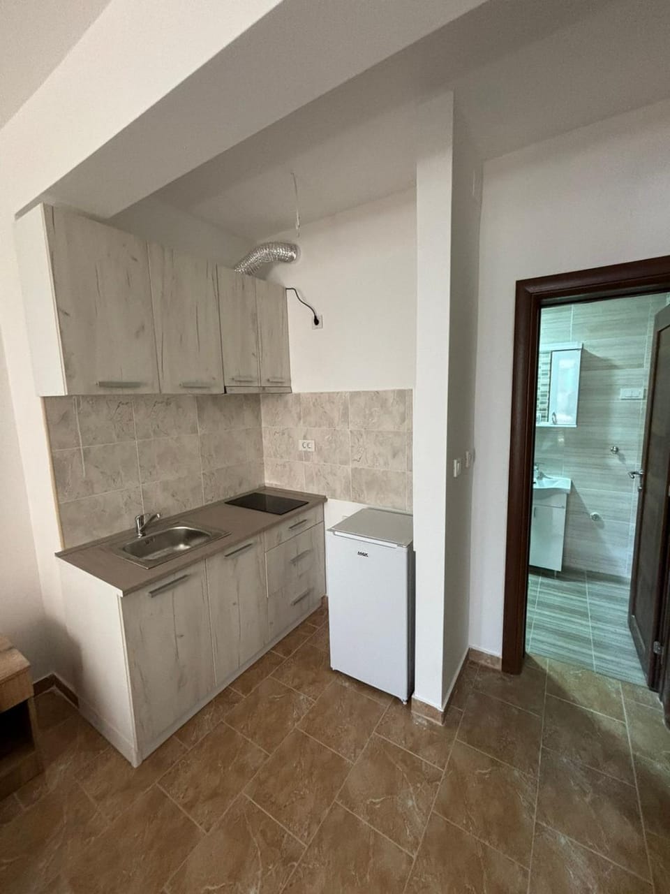 Kitchen or kitchenette, oven