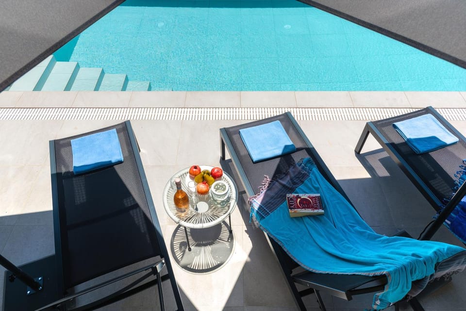Patio, Seating area, Pool view, Swimming pool, sunbed