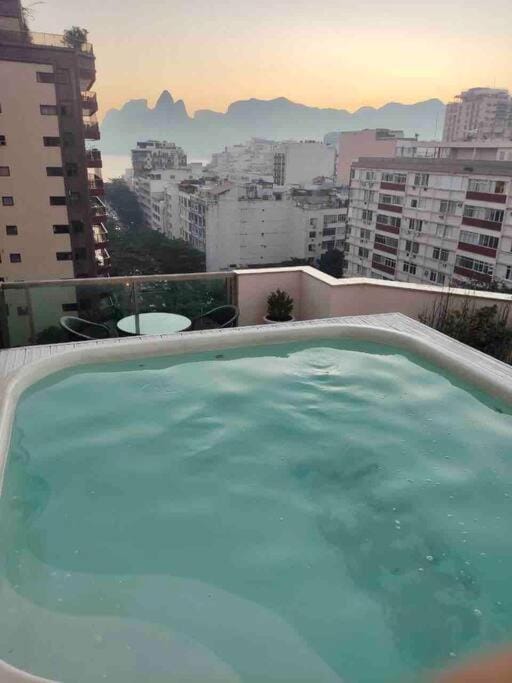 Property building, Nearby landmark, Day, Natural landscape, Hot Tub, Mountain view, Pool view, Swimming pool