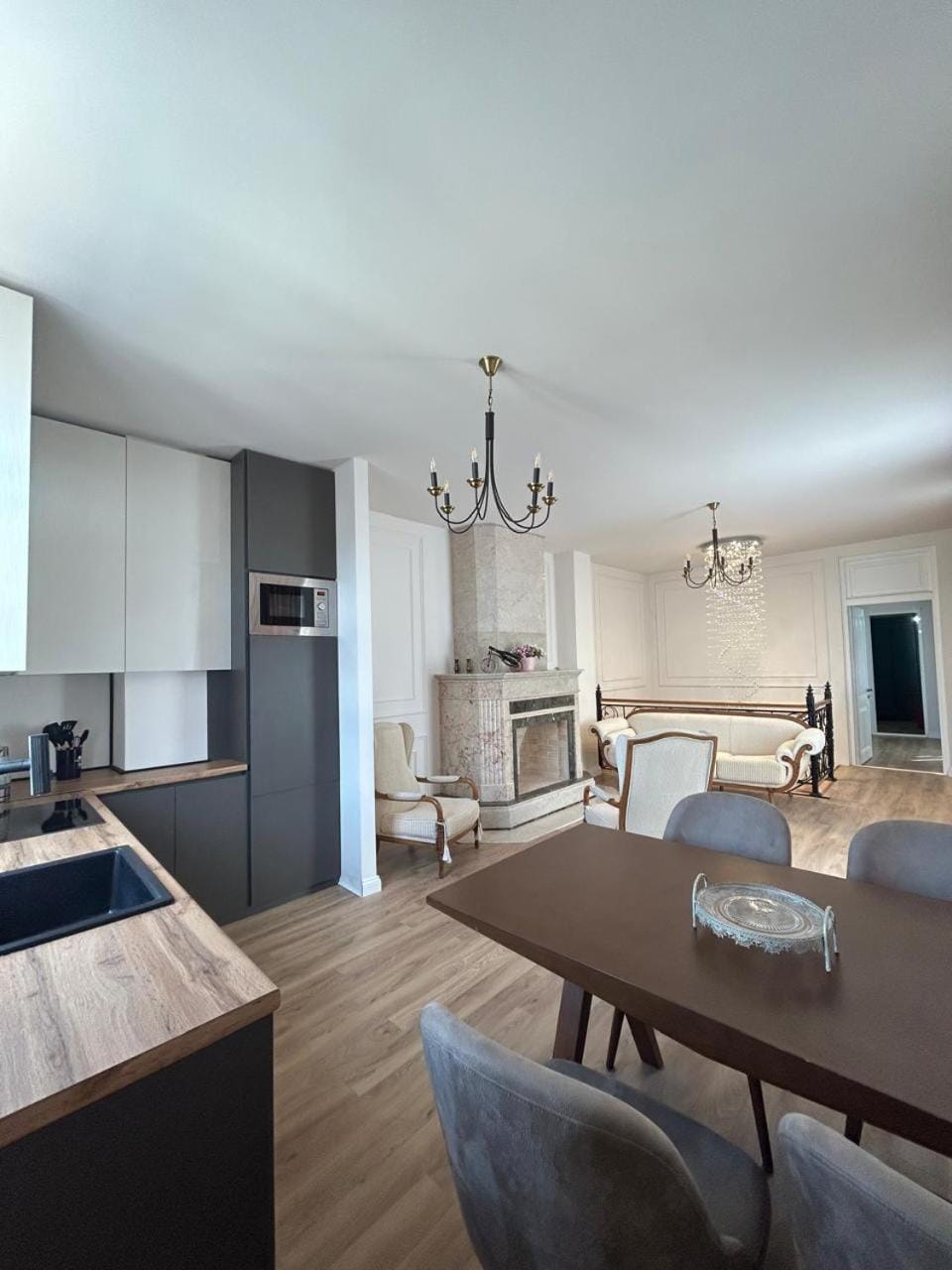 Kitchen or kitchenette, Living room, Decorative detail, Seating area, Dining area, fireplace, microwave, oven, stove