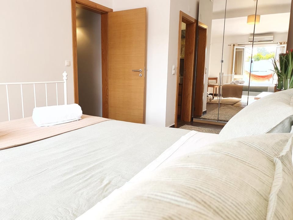 Bed, Bedroom, towels, wardrobe, air conditioner