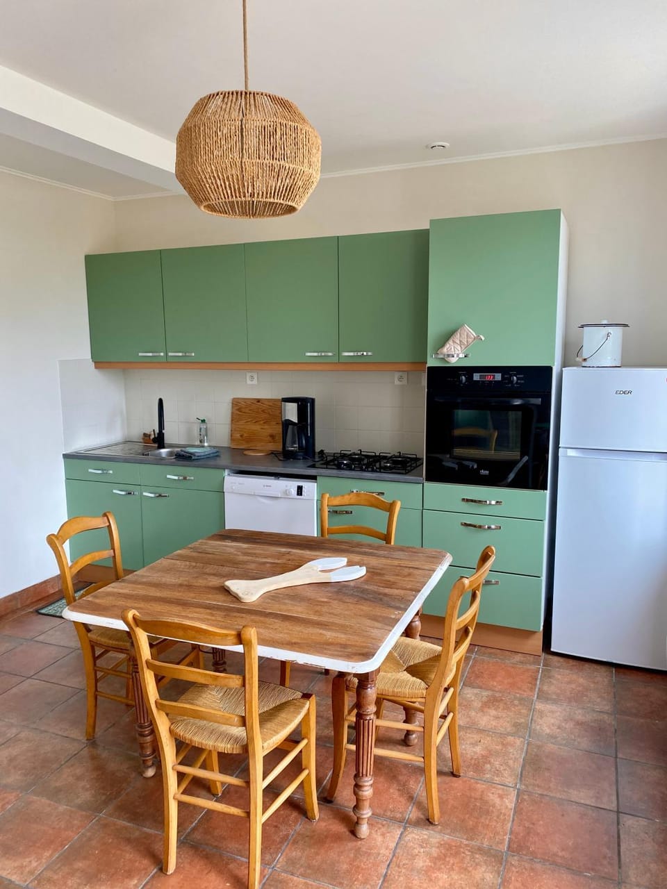 Kitchen or kitchenette, dishwasher, stove, toaster