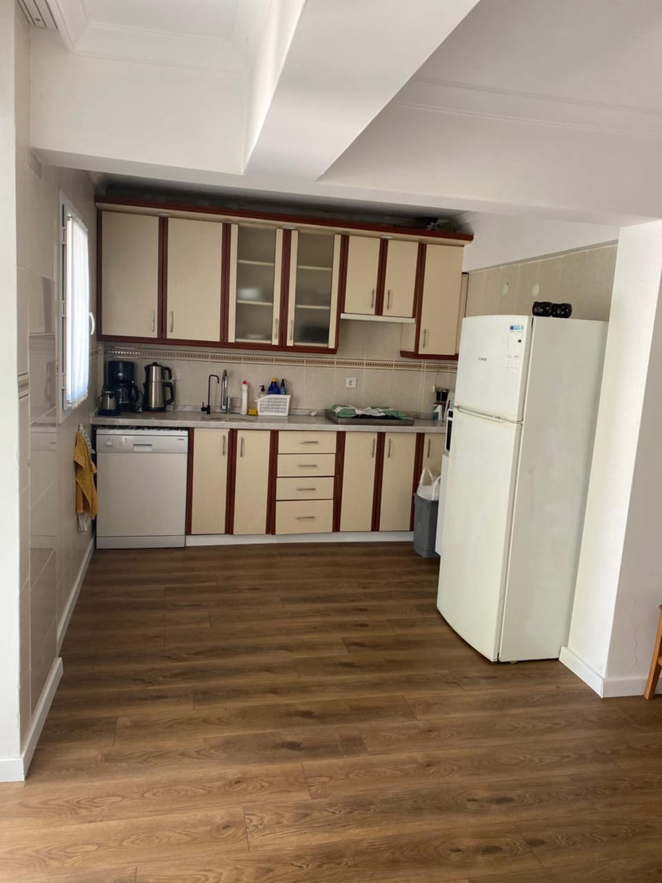 Kitchen or kitchenette, dishwasher, oven, stove