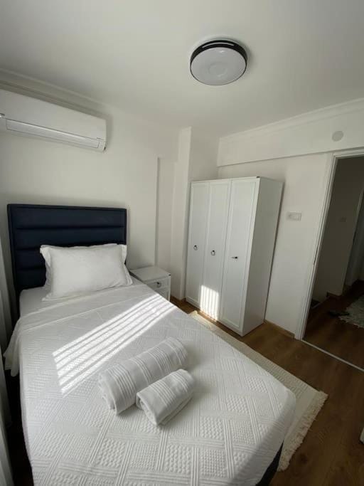 Bed, Photo of the whole room, Bedroom, towels, wardrobe, air conditioner