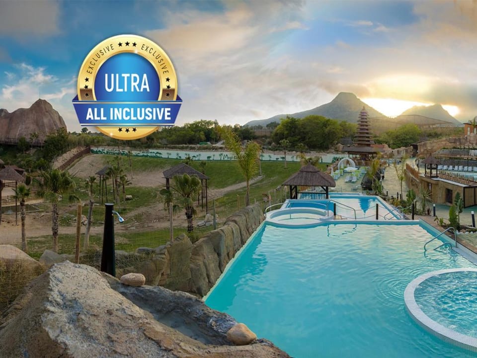 Day, Property logo or sign, Natural landscape, Logo/Certificate/Sign, Text overlay, Mountain view, Pool view, Swimming pool