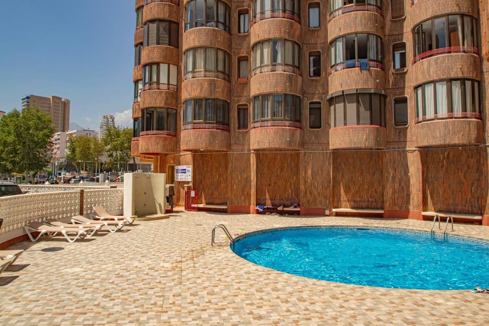 Property building, Living room, Swimming pool