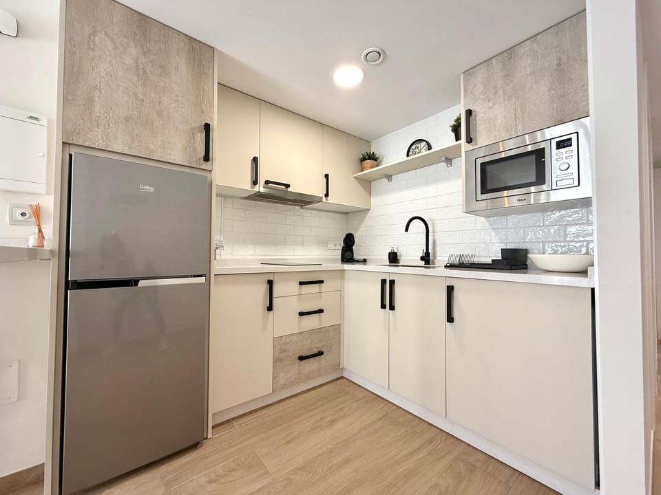Kitchen or kitchenette, stove, toaster