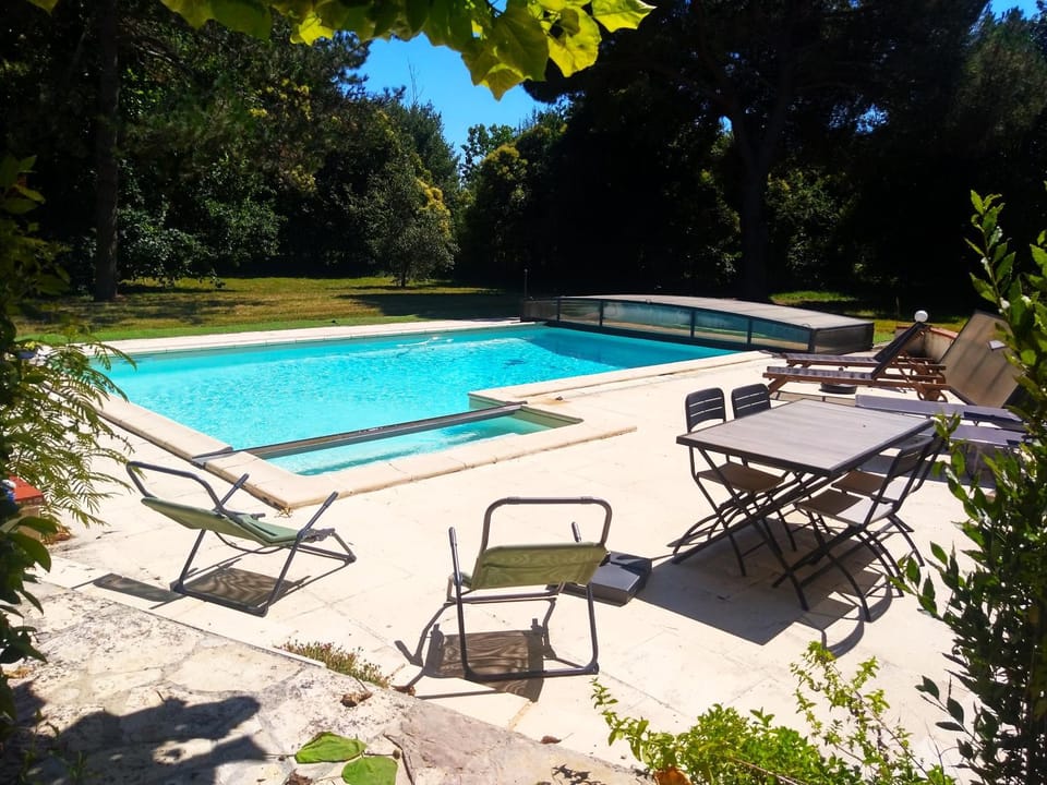 Property building, Dining area, Pool view, Swimming pool, sunbed