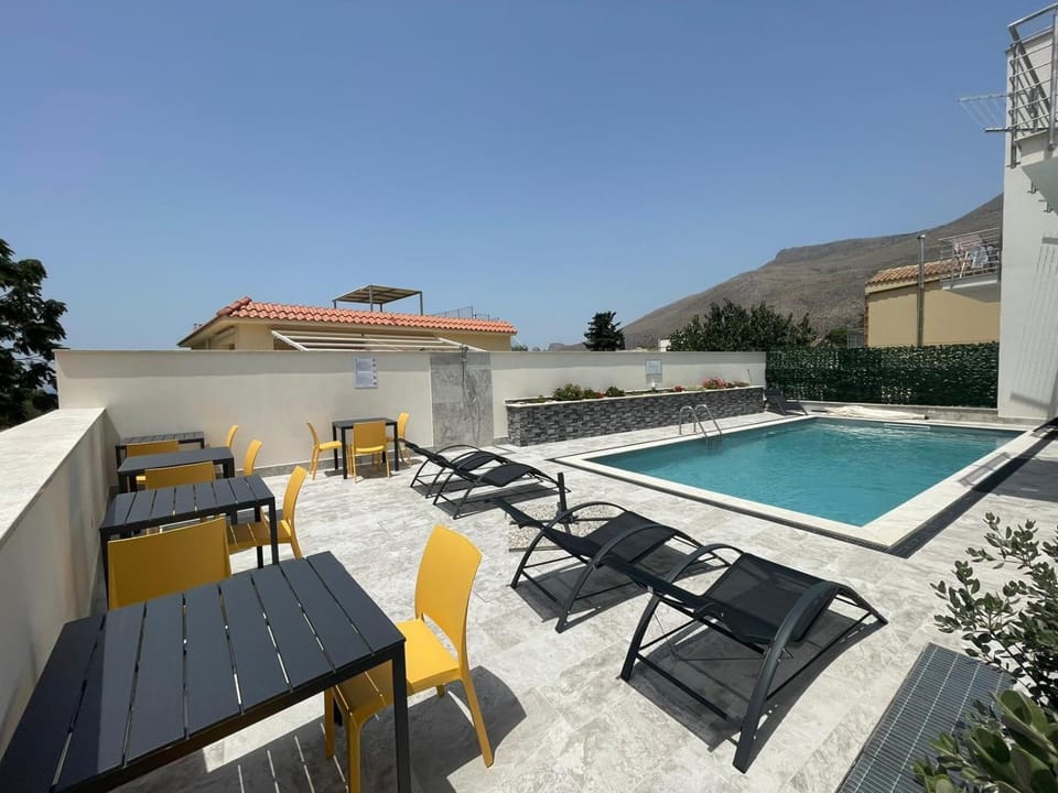 Patio, Day, Pool view, Swimming pool, sunbed