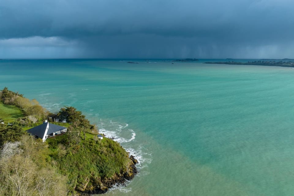 Property building, Day, Natural landscape, Beach, Sea view