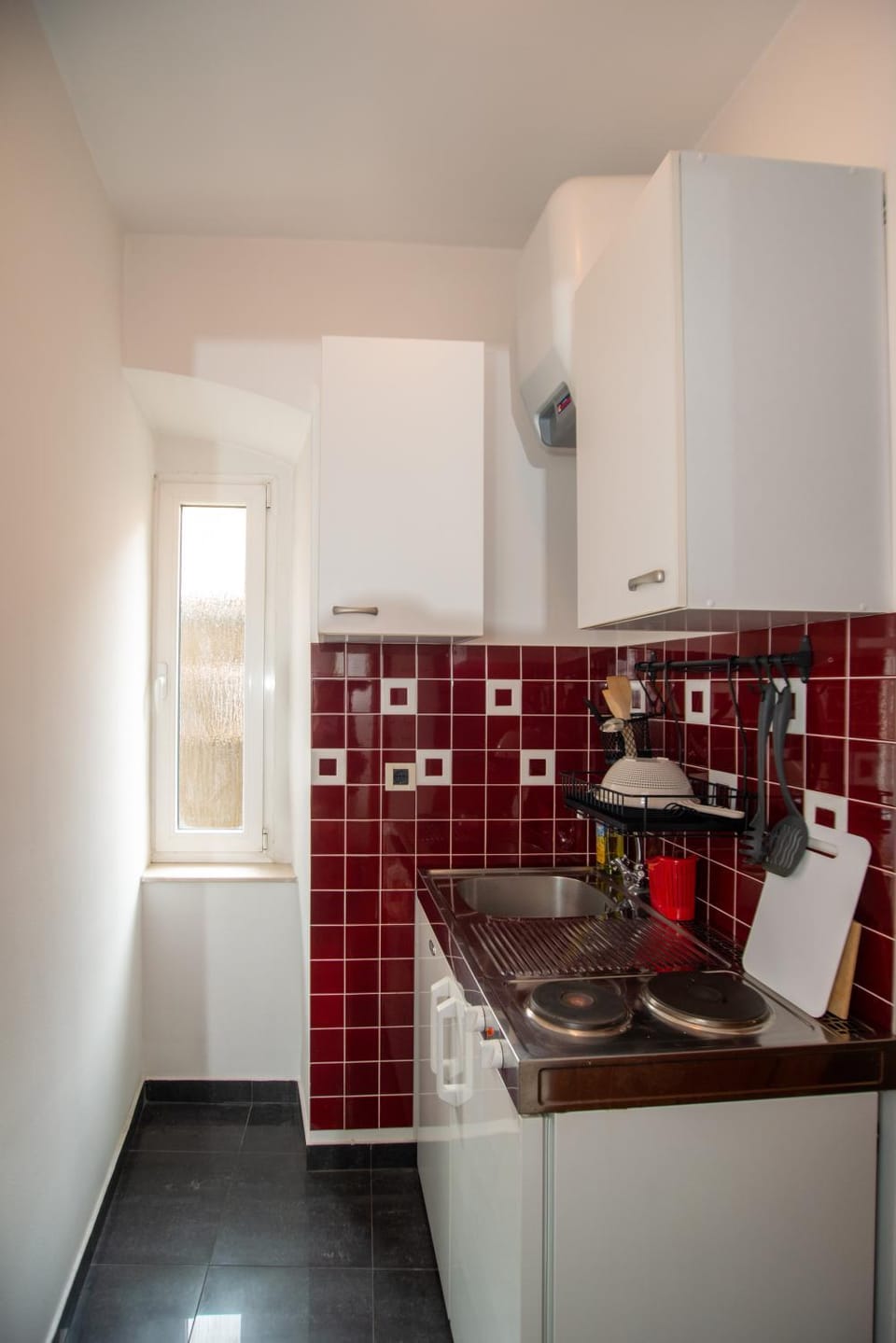 Kitchen or kitchenette, stove