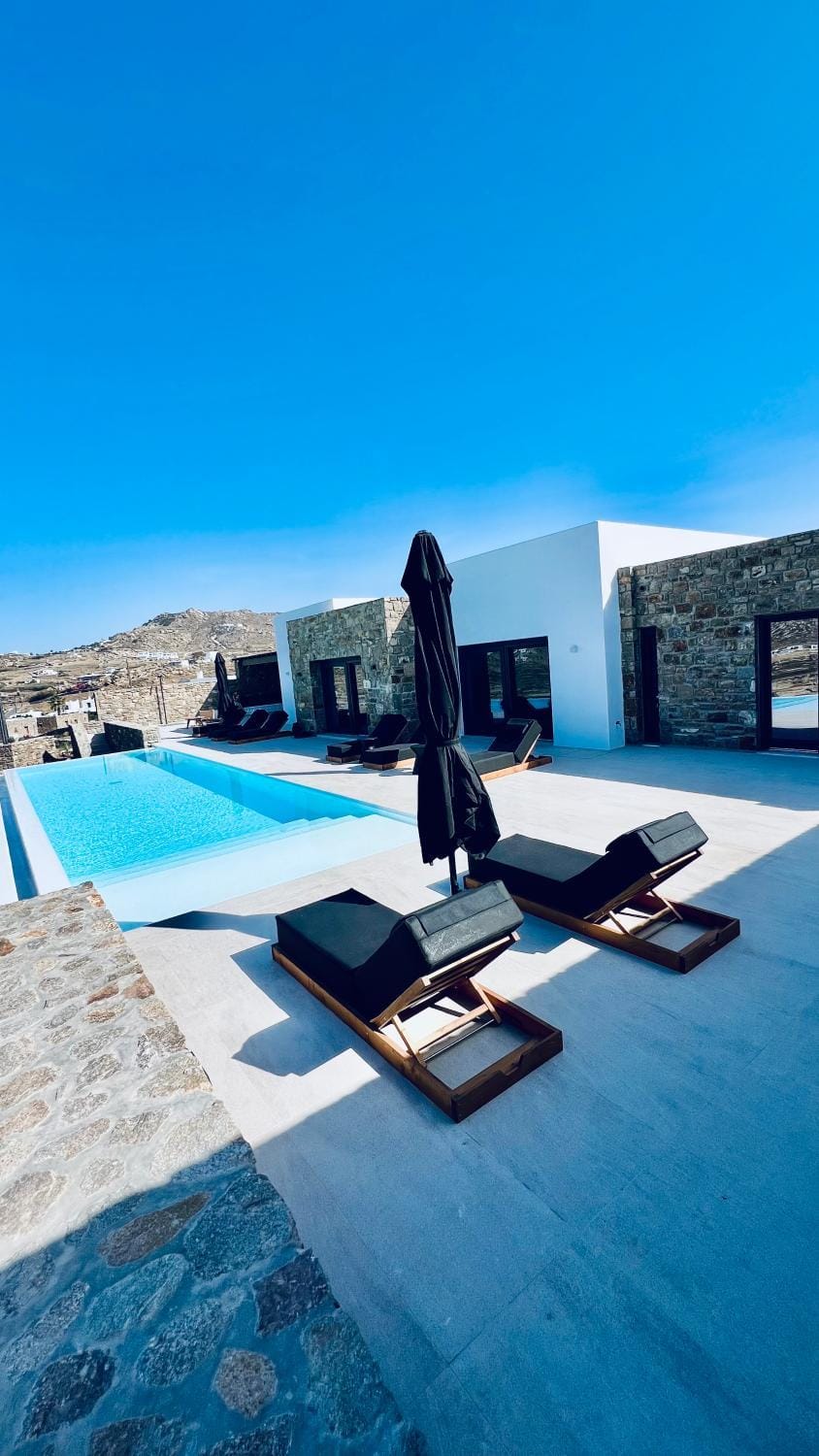Property building, Natural landscape, Pool view, Swimming pool, sunbed