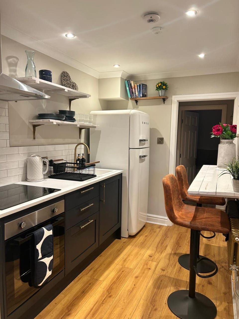 Kitchen or kitchenette, oven, stove, toaster