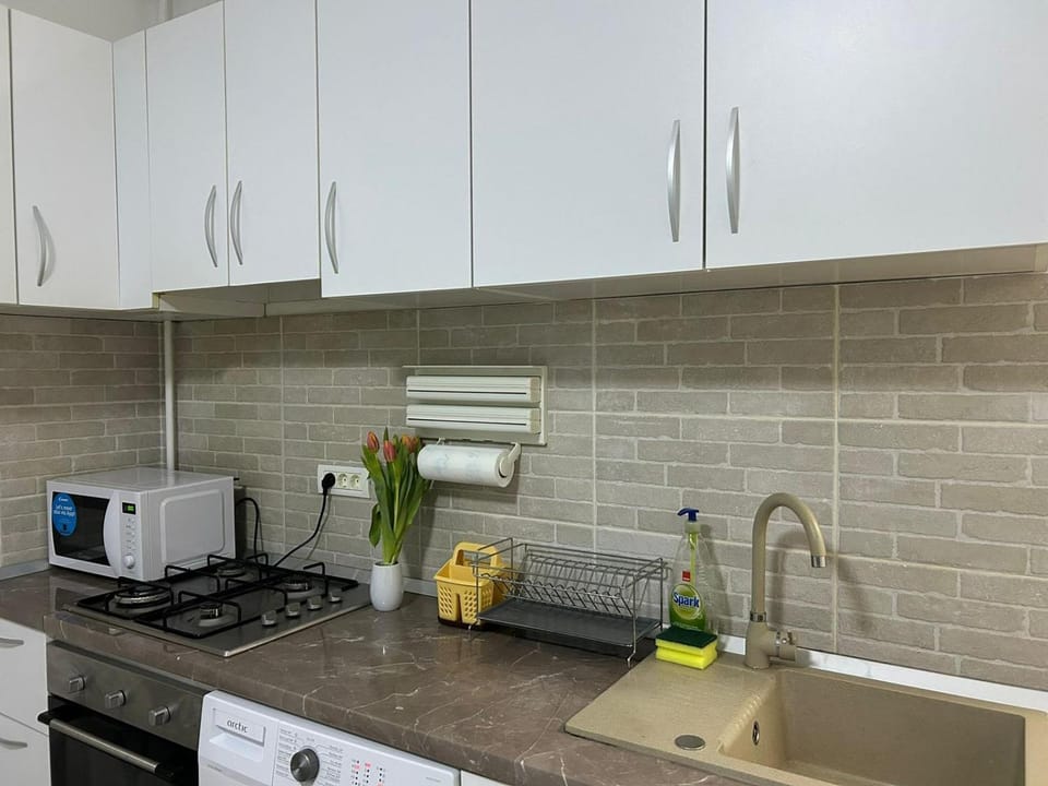 Kitchen or kitchenette, oven, stove