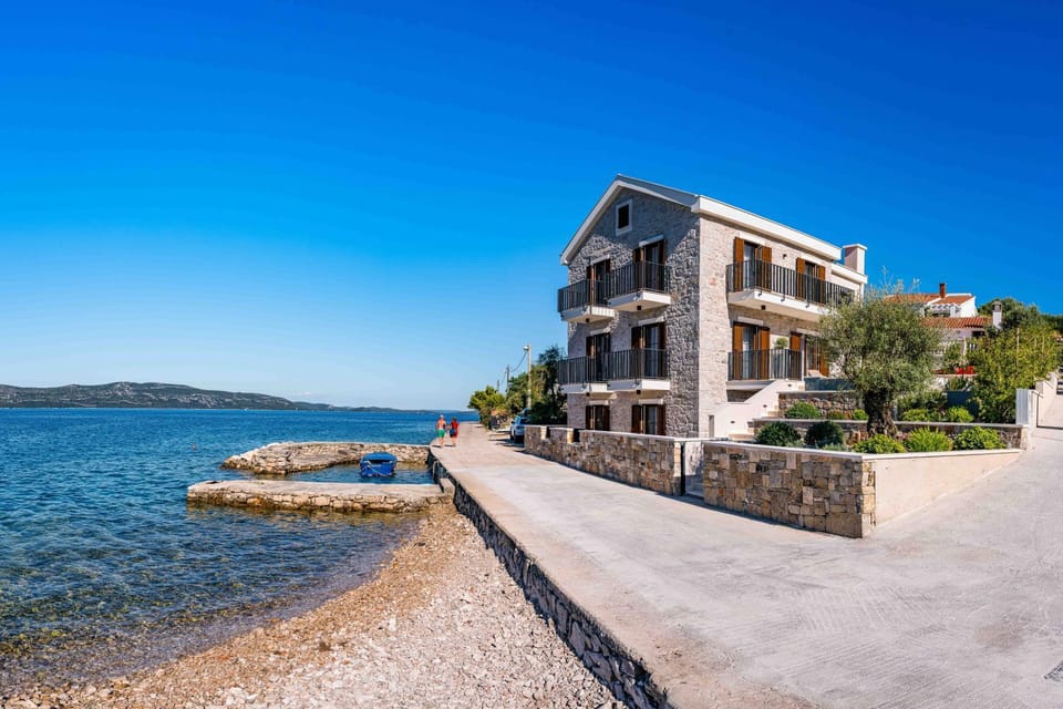 Property building, Day, Natural landscape, Beach, Sea view