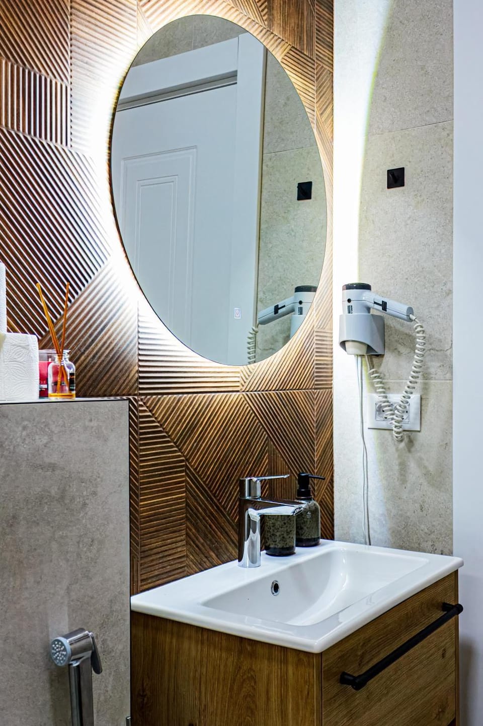 bidet, hair dryier, towels