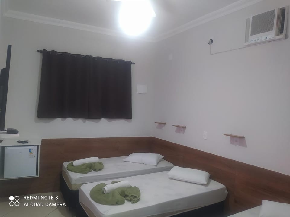 Pousada Quarto Aconchegante Suite com garagem perto da basílica Apartment hotel in State of São Paulo