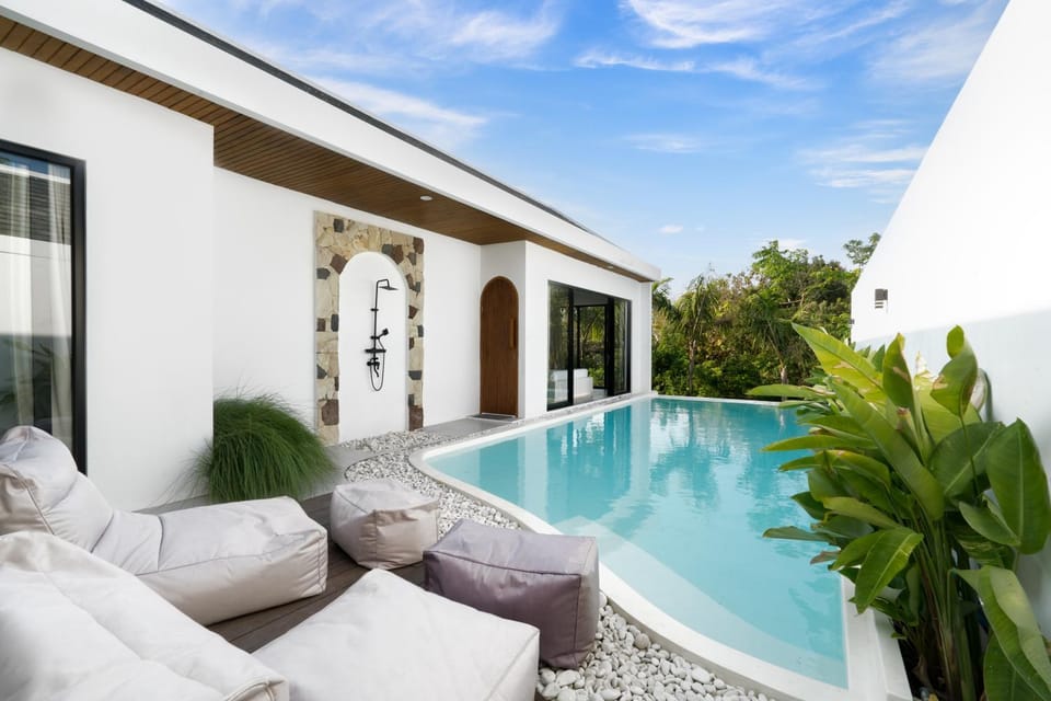 Shower, Property building, Seating area, Pool view, Swimming pool, sunbed