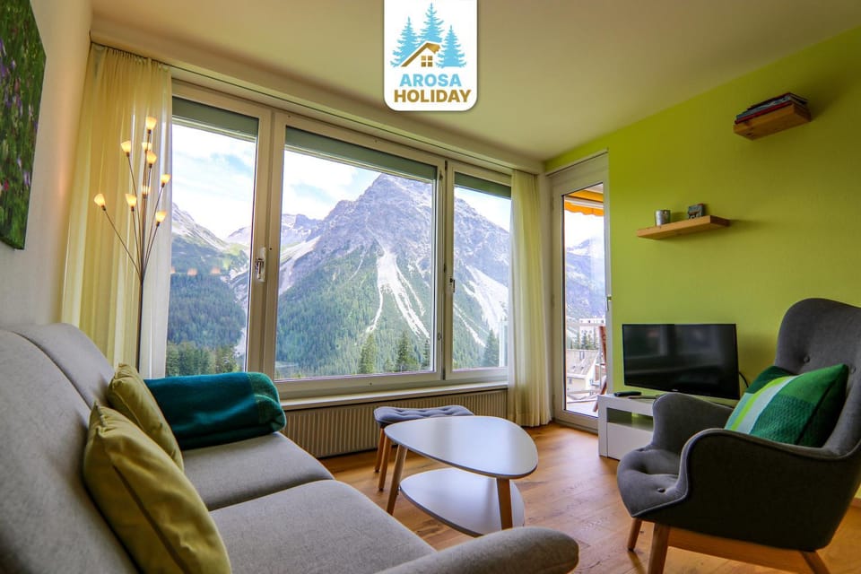 Communal lounge/ TV room, Natural landscape, Living room, Seating area, Mountain view