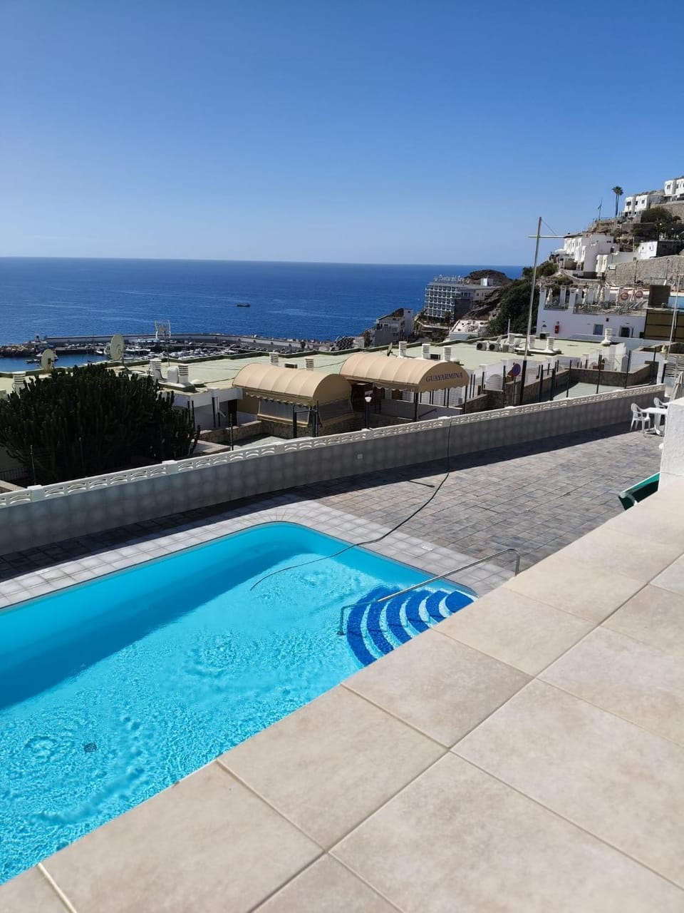 Property building, Living room, Swimming pool