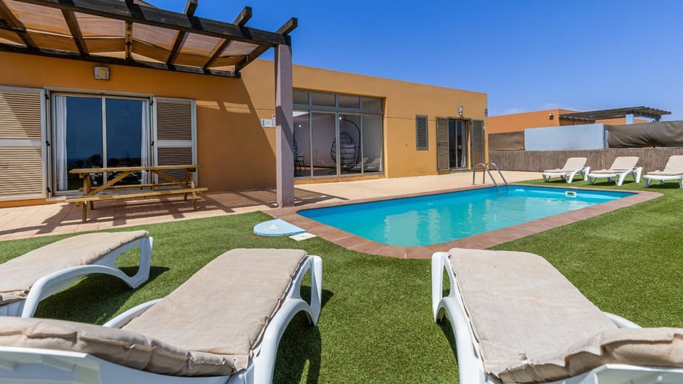 Property building, Day, Pool view, sunbed