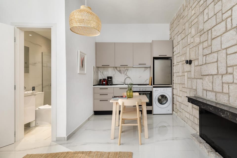 Kitchen or kitchenette, Dining area, dishwasher, oven, stove, washing machine