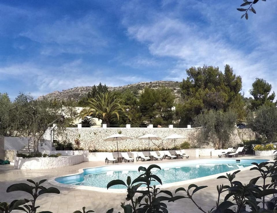 Property building, Living room, Swimming pool