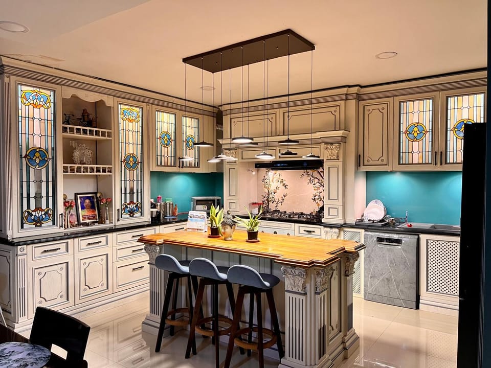 Kitchen or kitchenette, dishwasher, oven, stove