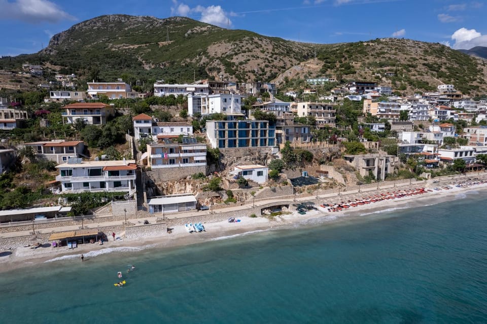 Property building, Day, Natural landscape, Beach, Mountain view, Sea view