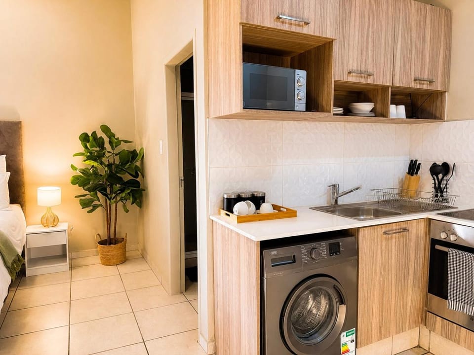 Kitchen or kitchenette, washing machine