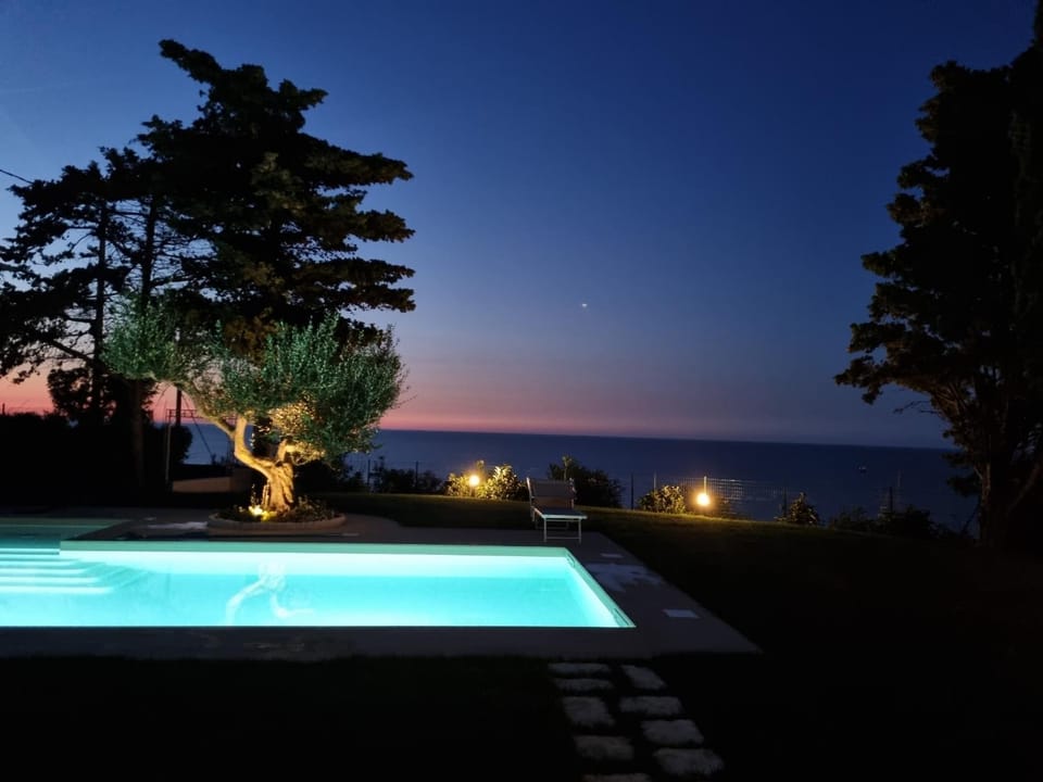 Night, Sea view, Swimming pool, sunbed