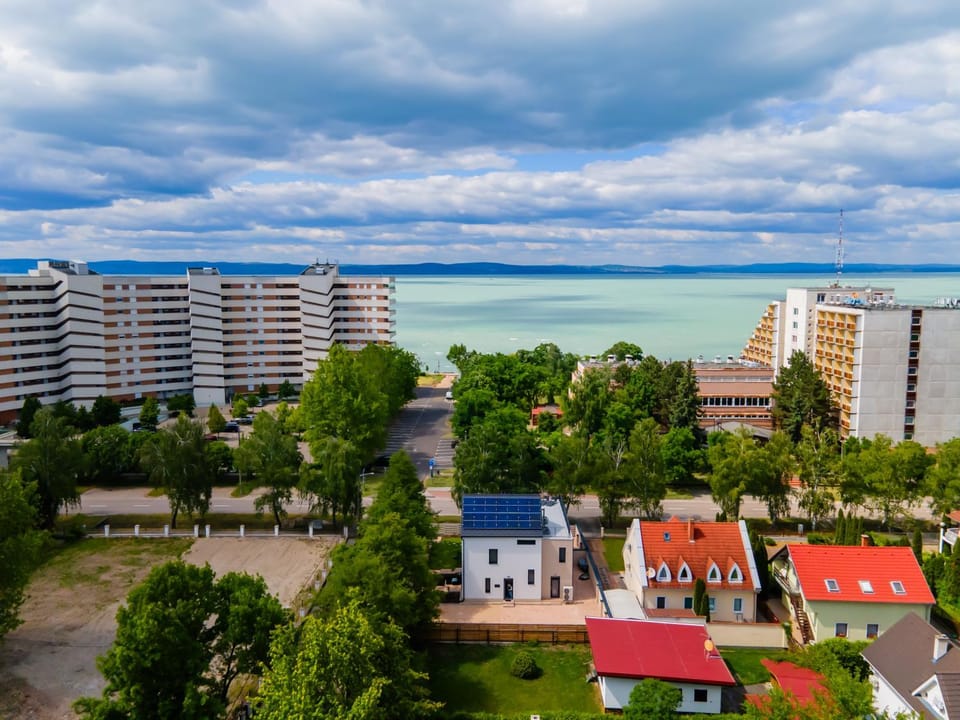 Property building, Nearby landmark, Summer, Beach, Lake view