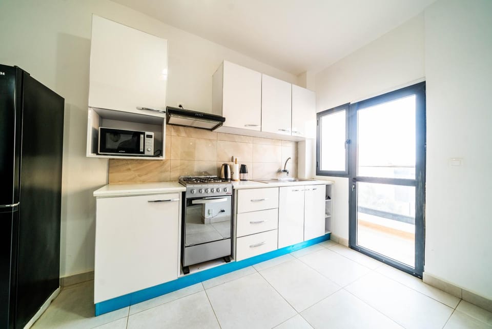 Kitchen or kitchenette, oven, stove