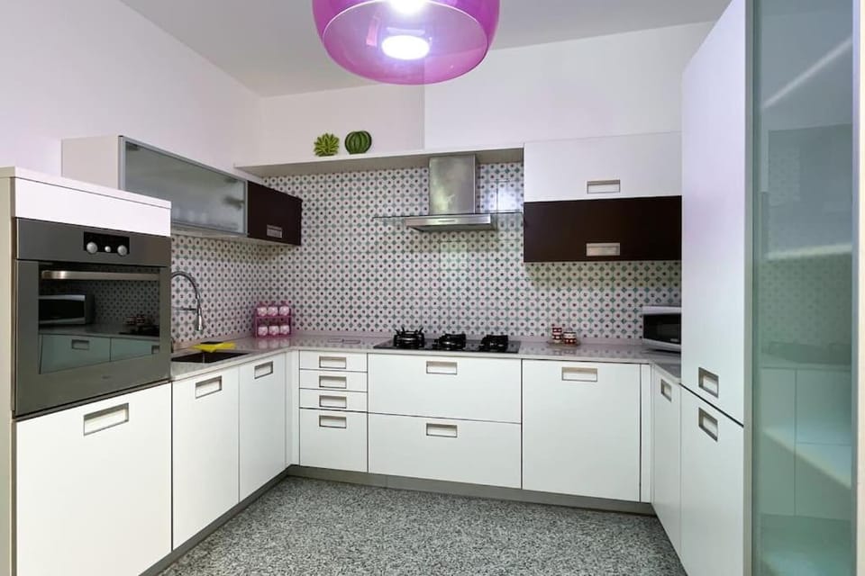 Kitchen or kitchenette, dishwasher, microwave, oven, stove