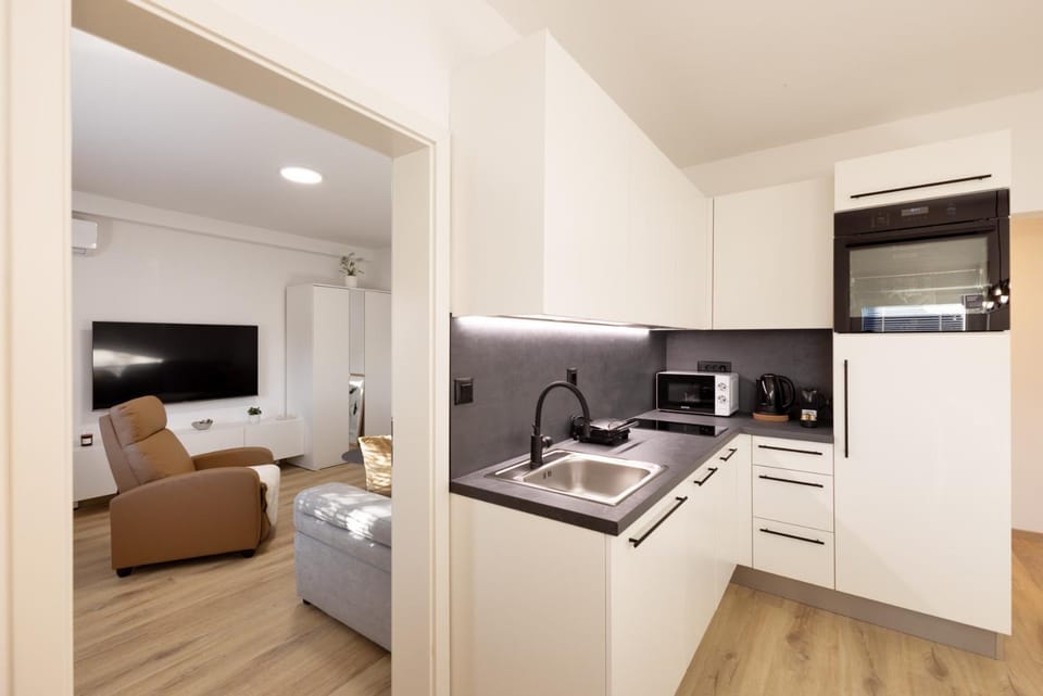 Kitchen or kitchenette, Living room, stove