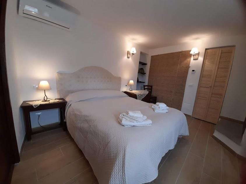 Bed, wardrobe, air conditioner