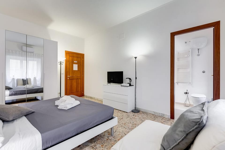 Bed, Bathroom, TV and multimedia, towels, wardrobe