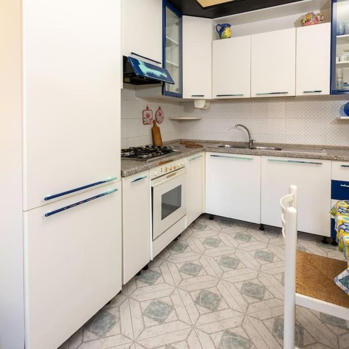 Kitchen or kitchenette, oven, stove