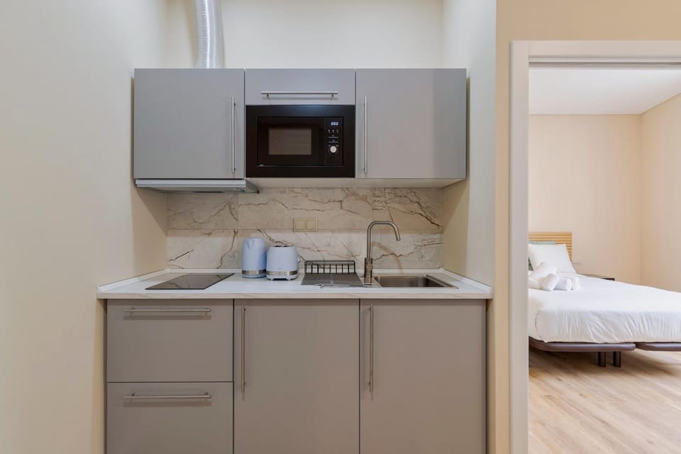 Kitchen or kitchenette, Bedroom, microwave, stove, stove, kitchen