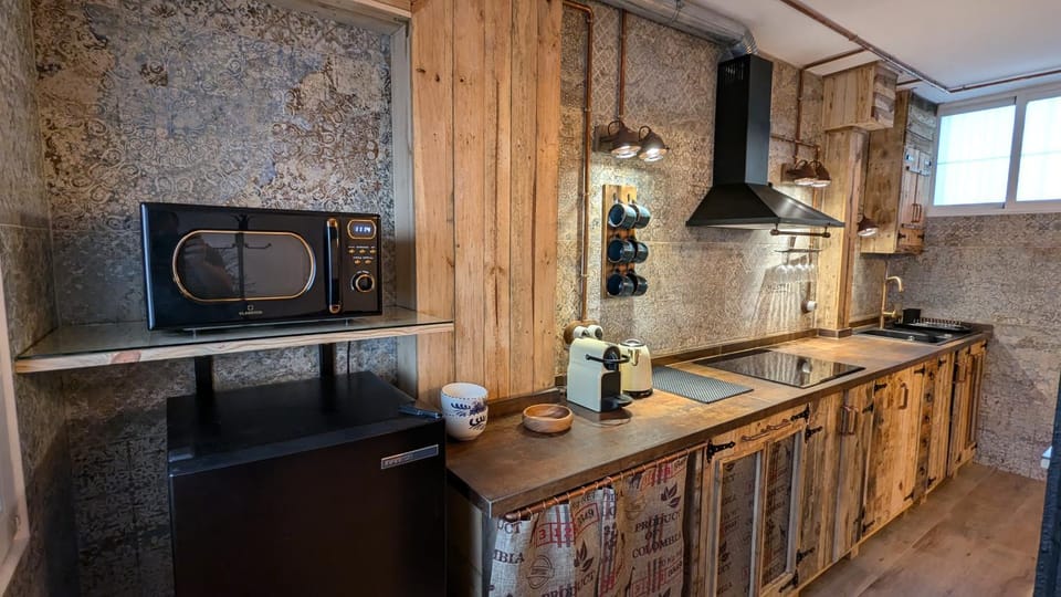 Kitchen or kitchenette, microwave, stove, kitchen