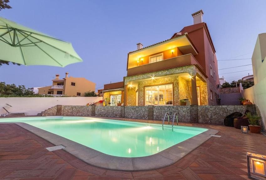 Property building, Patio, Pool view, Swimming pool, sunbed