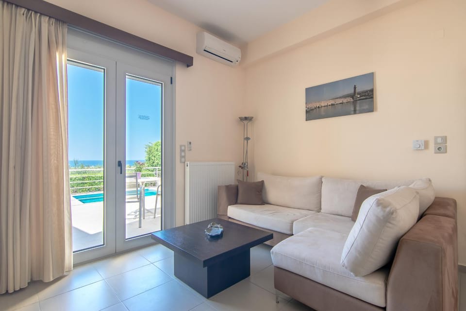 Natural landscape, View (from property/room), Balcony/Terrace, Living room, Seating area, Pool view, air conditioner