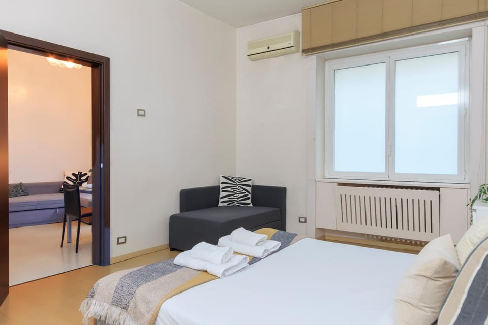 Bed, Photo of the whole room, Bedroom, towels, air conditioner