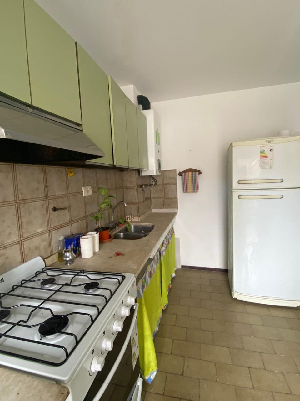 Kitchen or kitchenette, oven, stove