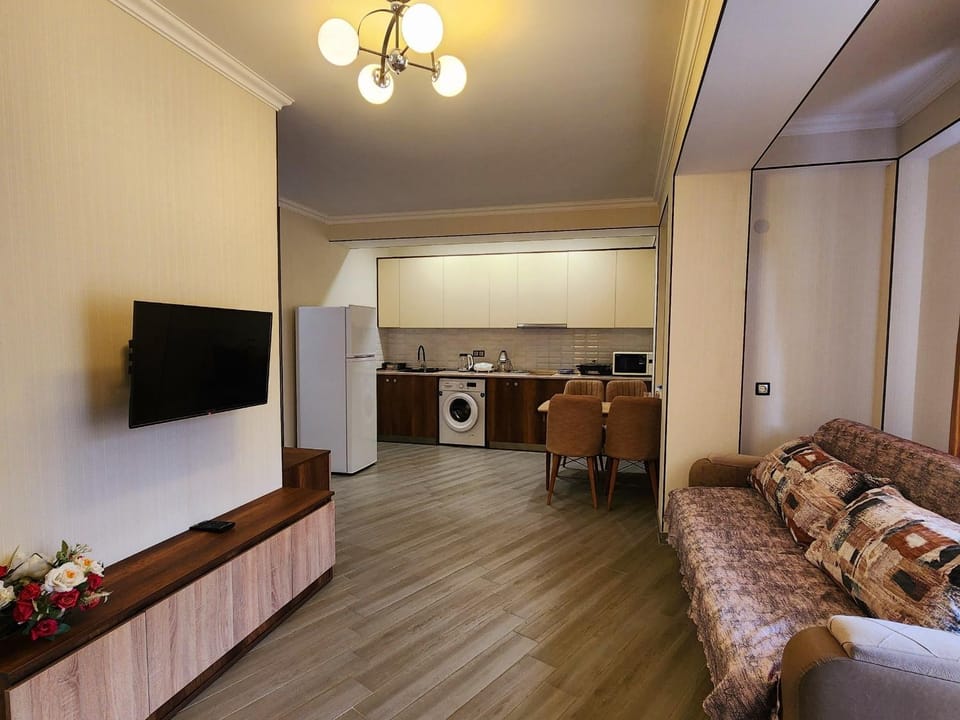Kitchen or kitchenette, Living room, Seating area, Dining area
